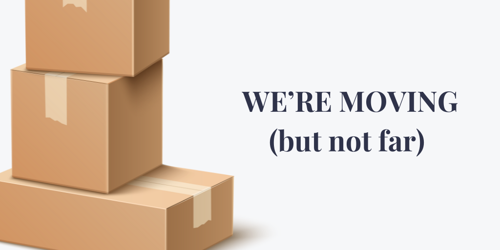 Stack of three cardboard boxes with text: “We’re moving (but not far).”